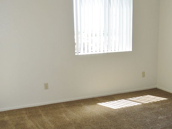 2nd Bedroom Area w/ Private Slider & Carpet Flooring