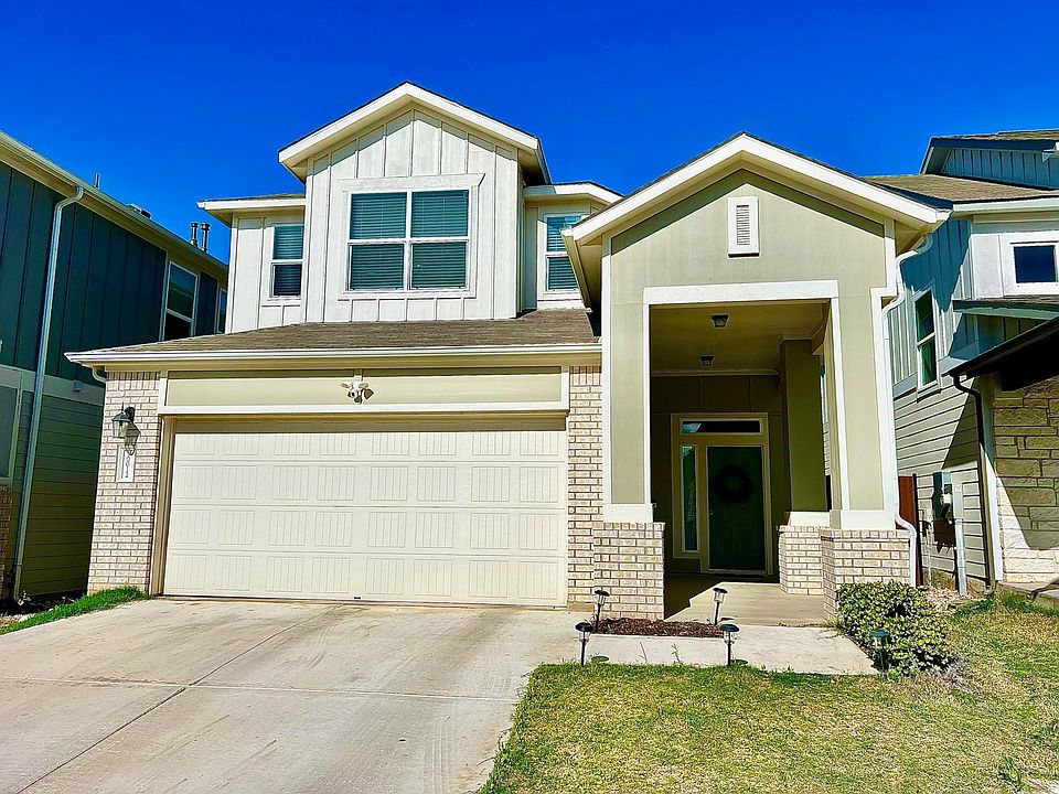 Front of the Home with two-car Garage and extended covered Porch.