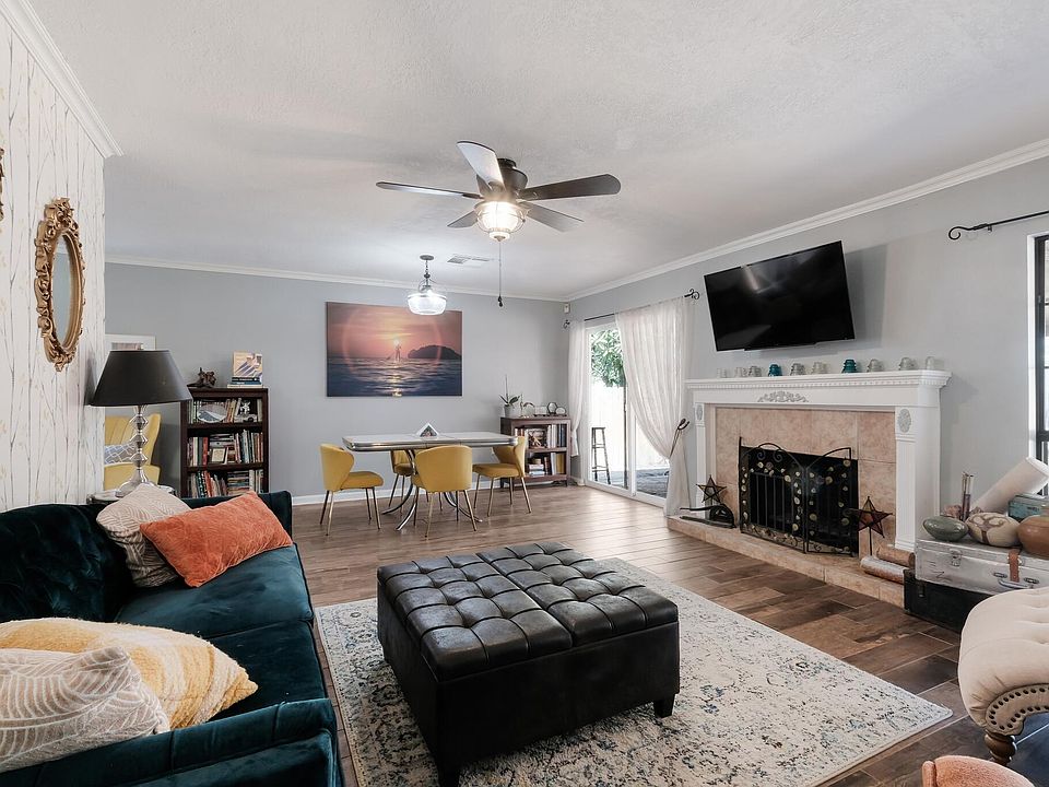 Great space for the whole family. Wood burning fireplace, soft and luxurious fabrics, and a lively color pallet make this space super inviting