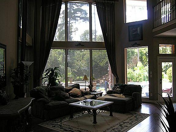 Downstairs den showing soaring ceilings and fabulous views