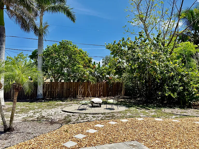 Fenced in back yard. Plenty of room for a small dog to run.