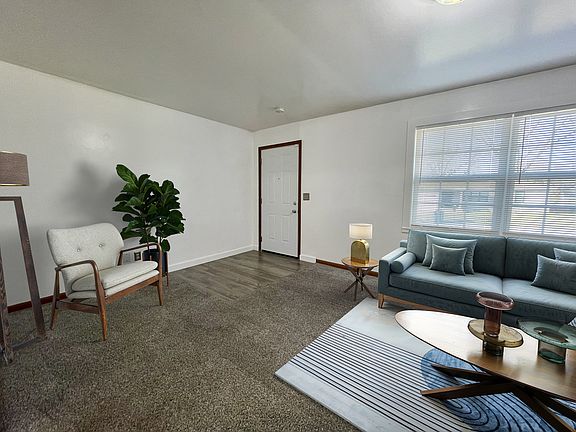 Living Room - Furniture is styled to show how modern furniture would look, but any style of furniture will make it homey.