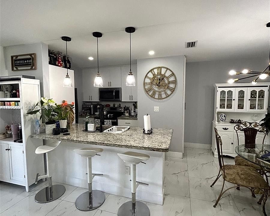 1st image of 15645 SW 74th Circle Dr #5-4