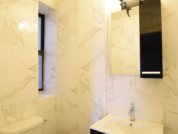 5th image of 145 W 145th St APT 32