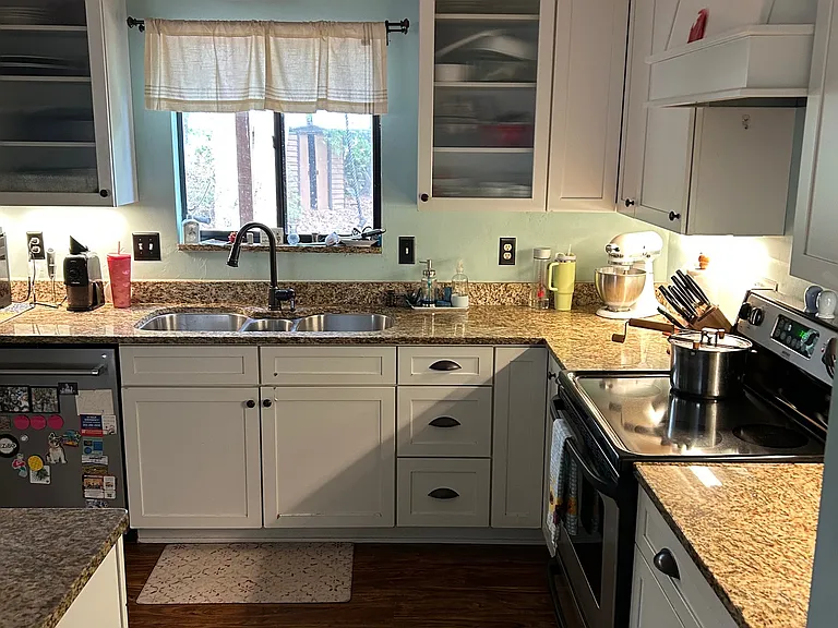 large and open remodeled kitchen with tons of storage and functional design