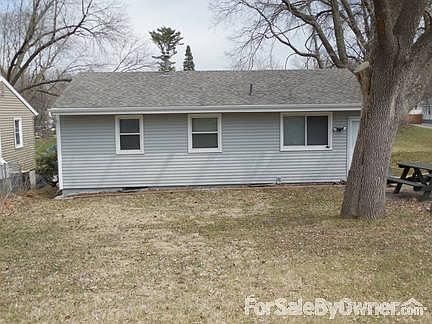 Rear of the house
						:
						This view is looking from half way across the backyard