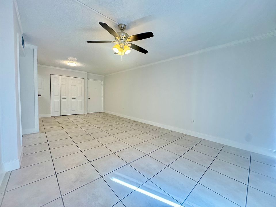 Spacious living room with large storage closet
