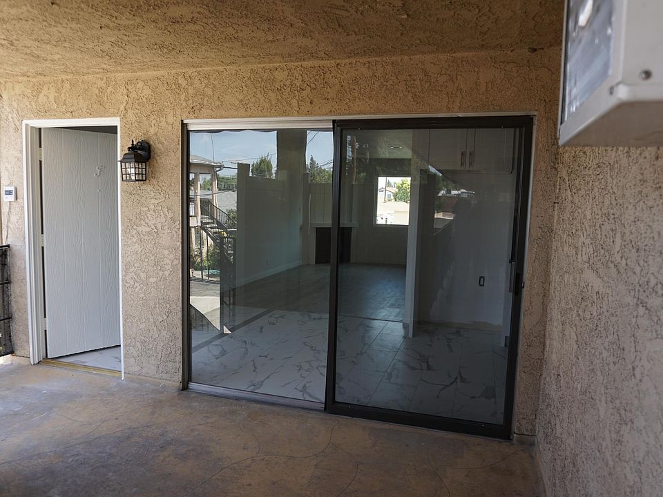 Private Patio & Entrance To The Front Door With Direct Access To The Kitchen.