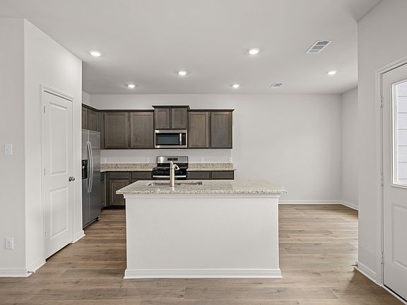 The kitchen has a convenient island.