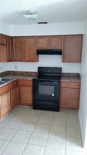Kitchen View (Please note - all units have the same layout. Appliance colors may vary)
