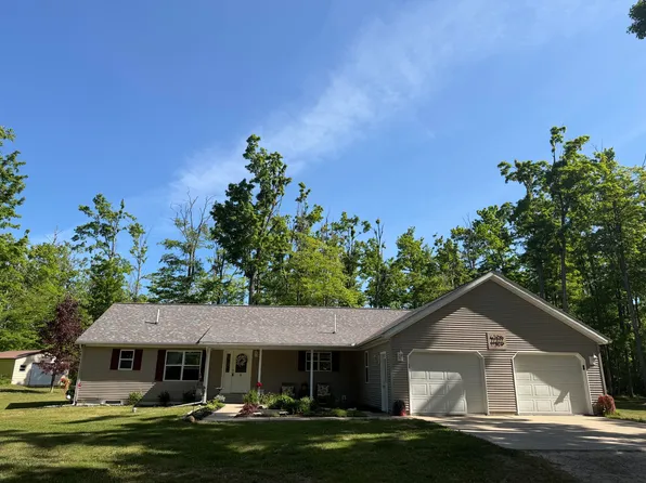 11311 Woodside Dr, Elmira, MI 49730