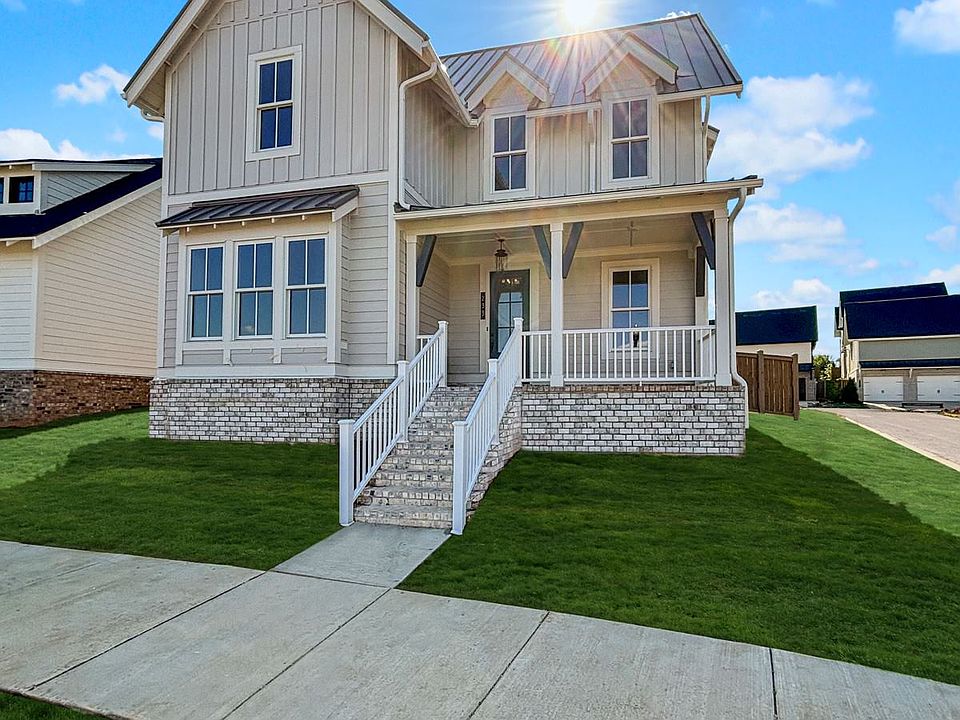 Front View with "added grass" for visualization as home is still being built. You'll be the first ever to live in the home! Yard to be finished with beautiful, upgraded landscaping package once complete.