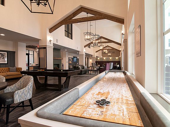 Experience upscale leisure in this beautifully designed recreation room, perfect for relaxation and entertainment.
