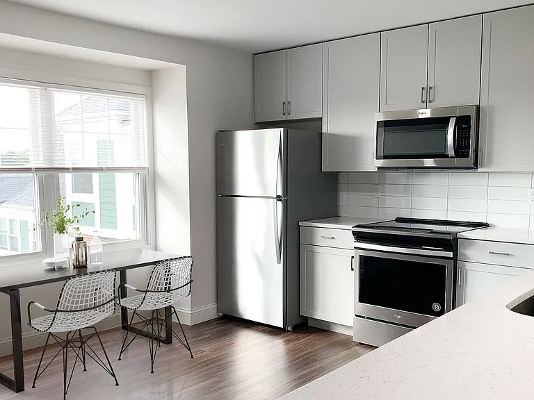 Our renovated kitchens offer brand new cabinetry, quartz countertops, and stainless steel appliances