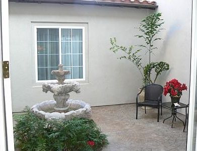 This cozy courtyard is just outside the dining and family rooms