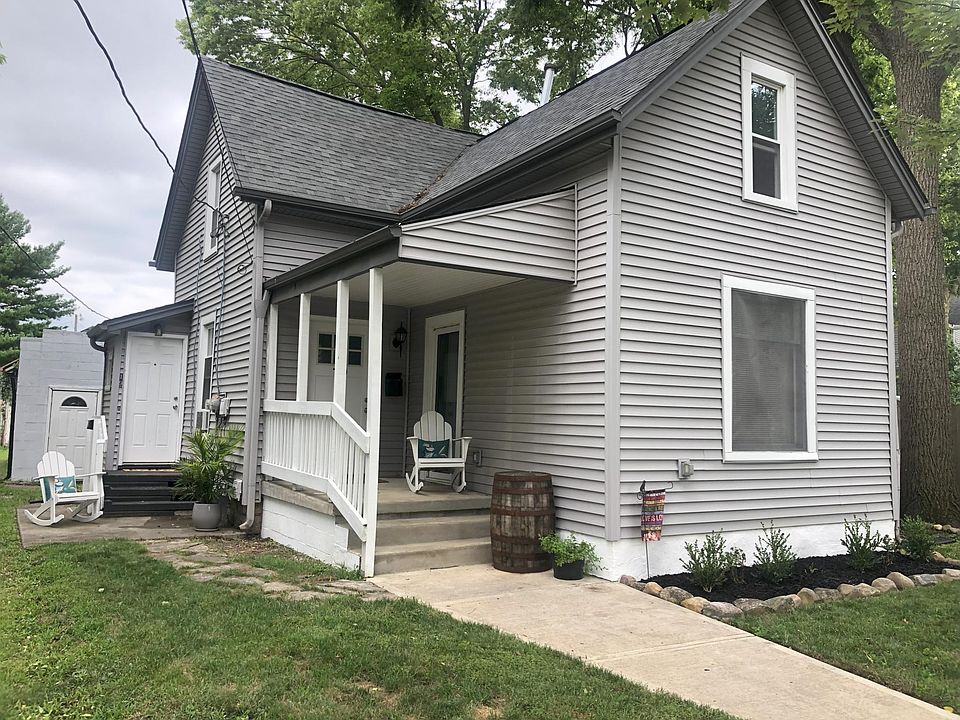 Outside of house. Private side door entrance on left side of house.
