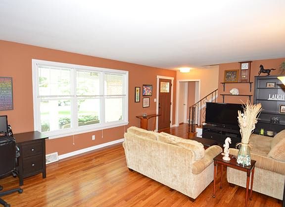 Living Room w/ new Feature Window and Hardwd Flrs