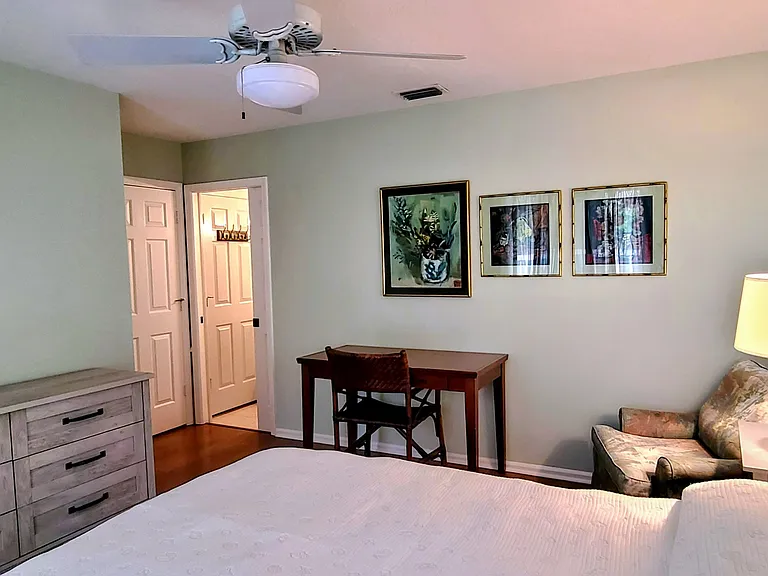 Large bureau, desk, and armchair