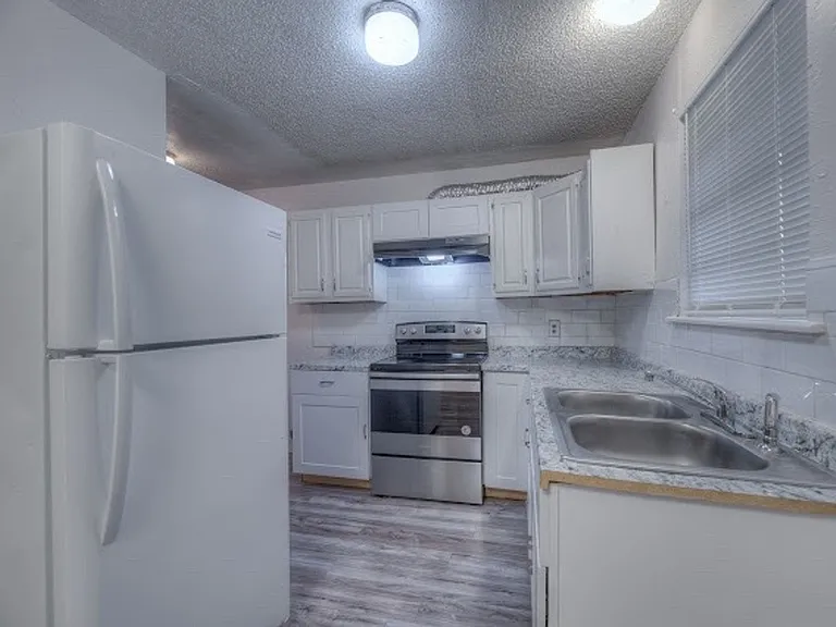1129 S 124th East Ave — Photo 1
