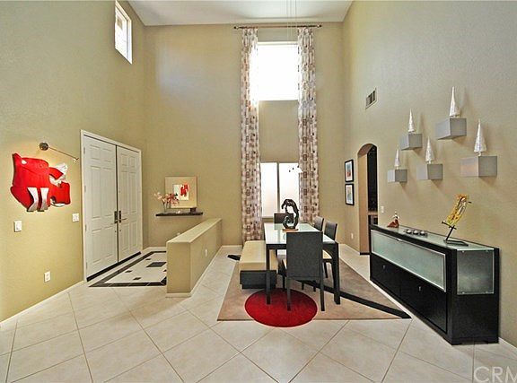 Stunning open design under soaring 2-story ceiling.