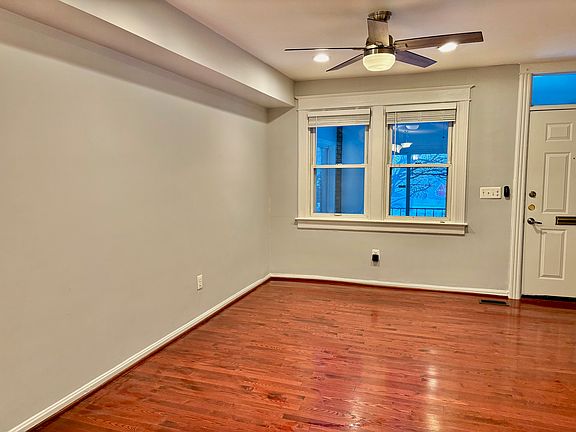 Hardwood floors in this spacious living room