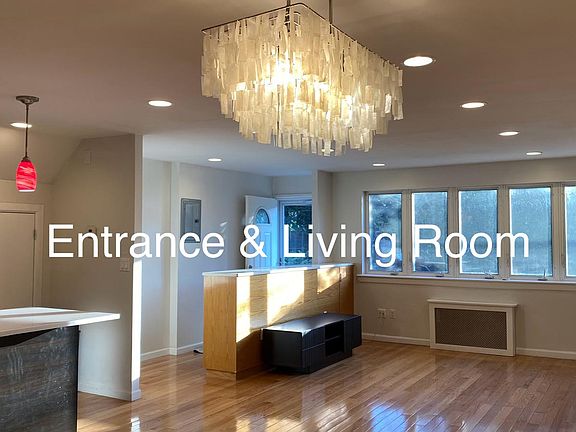 A closer look at the living room and entrance.