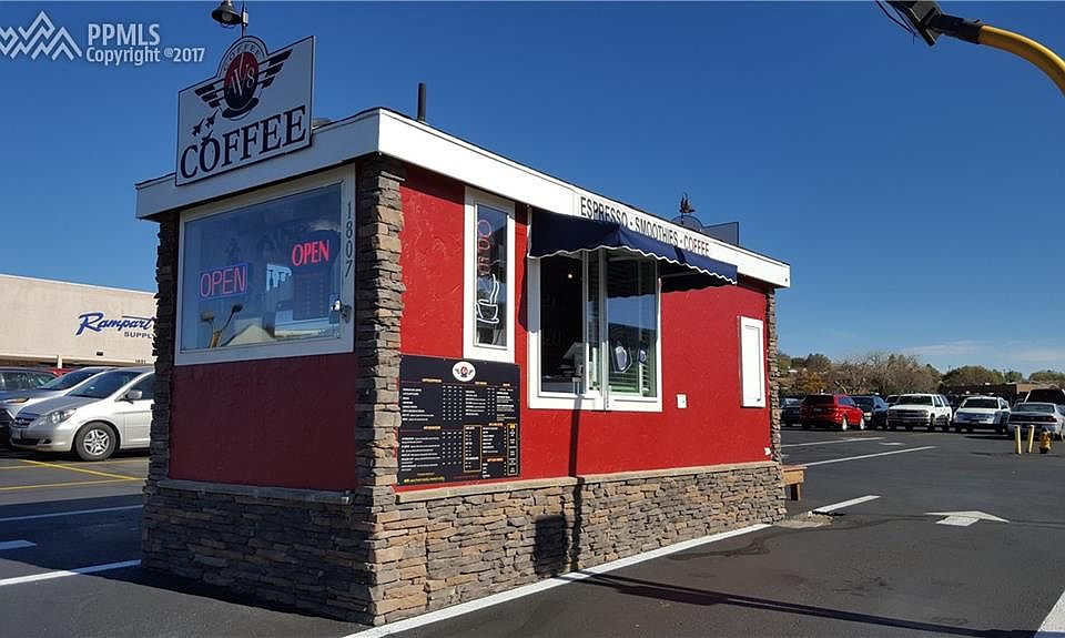 Stone accents and signs on each side make this an attractive drive-thru. There