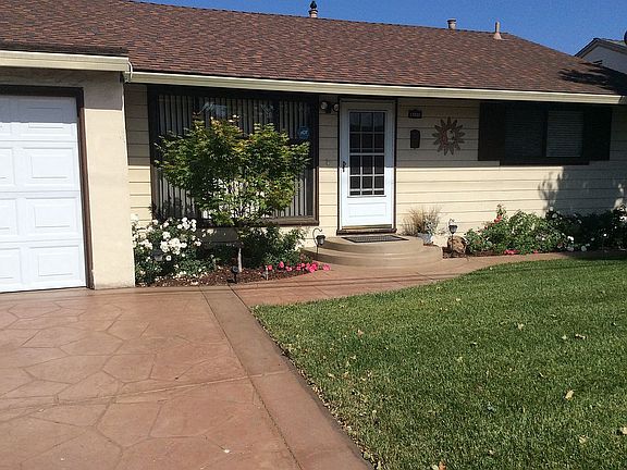 Front with stamped driveway