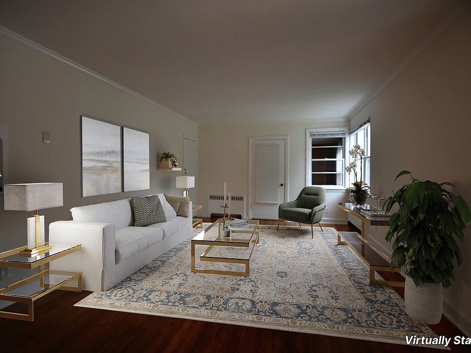 This is the view of the Living Room from the Dining Room in front of the Front Door.