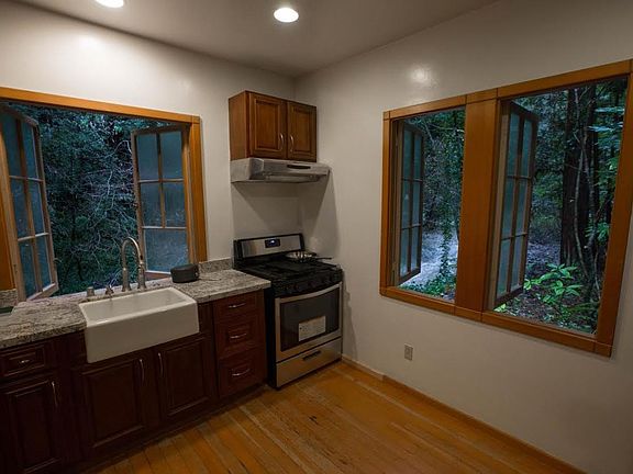 A Kitchen with Creek Views