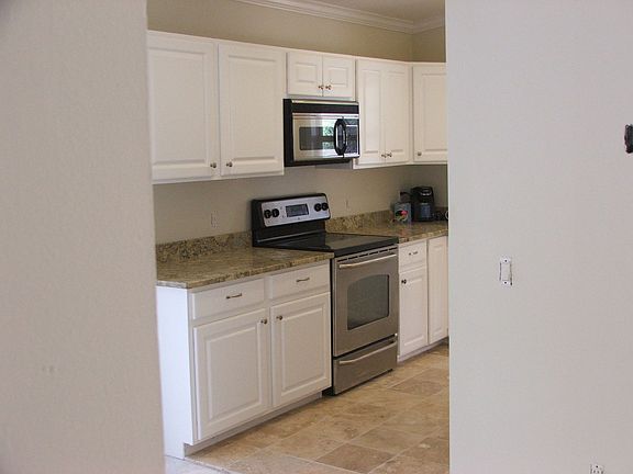 Kitchen with SS appliances