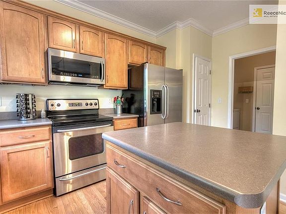 Stainless steel appliances and center island