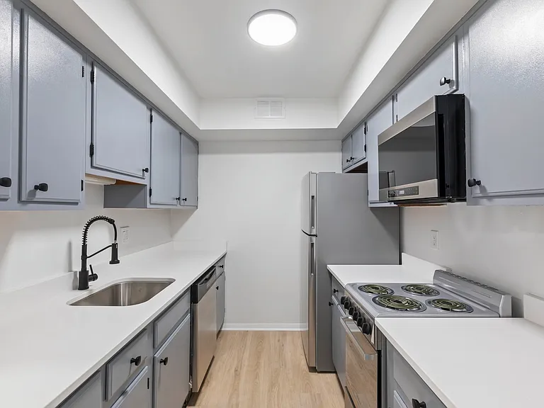 All kitchens have SS appliances, quartz counters and modern faucets