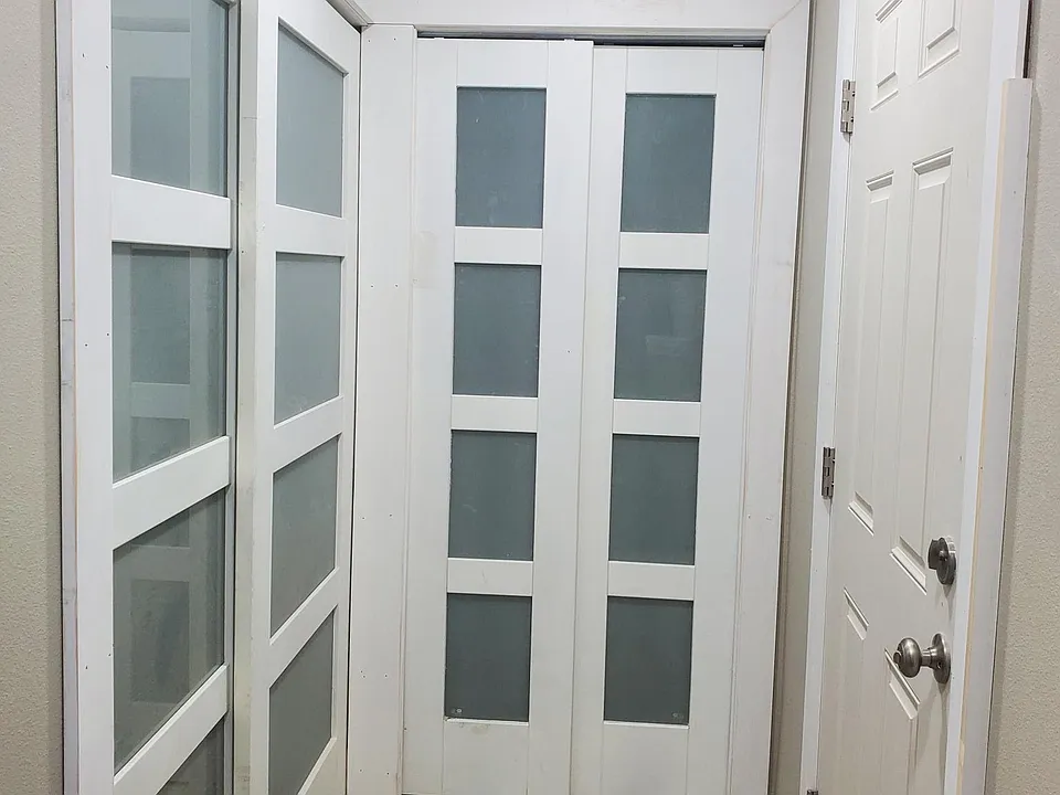 Entranceway with 2 large closets. Both have accent lighting inside. Dimmers on most lights. This home has wonderful accent lighting and is very warm and welcoming