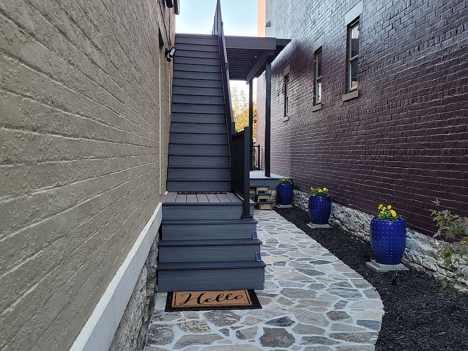 Stairs to 2nd floor outdoor patio and entrance