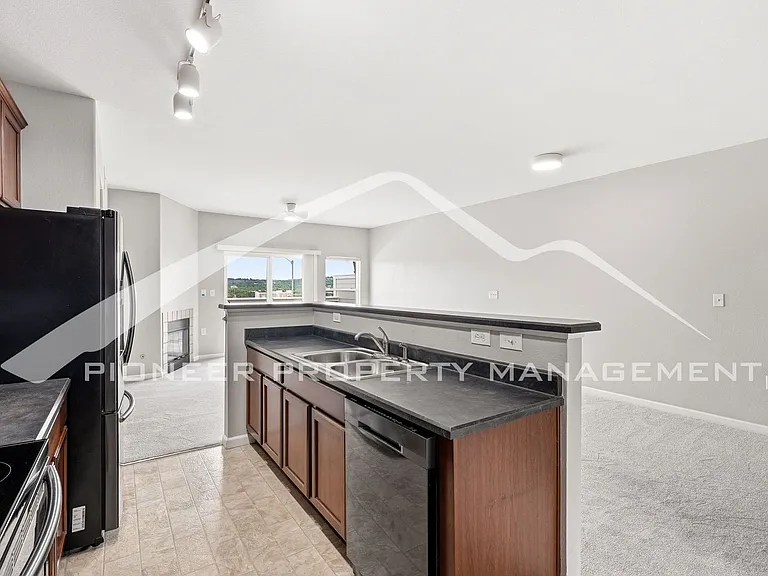 10089 W 55th Dr #203 — Photo 13