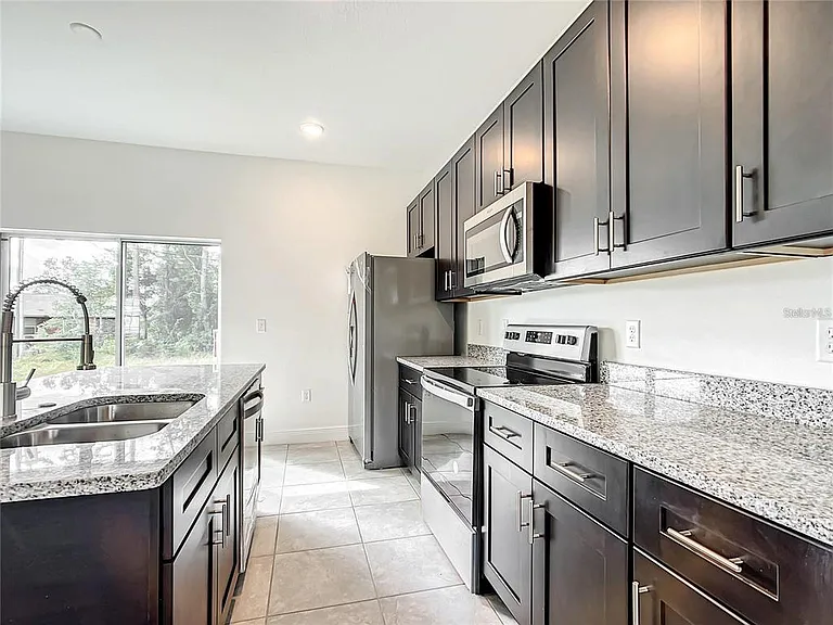 406 Marion Oaks Trl — Photo 21