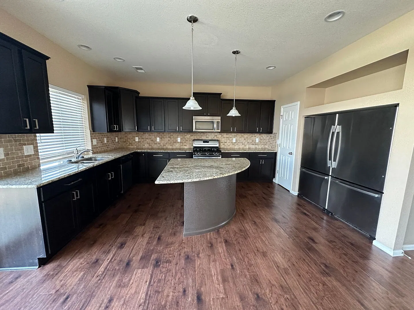Spacious 4-Bedroom Home with Fenced Backyard, Central A/C & 2-Car Garage! — Photo 4