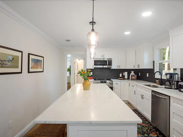 This home is warm and welcoming. Great artwork too!