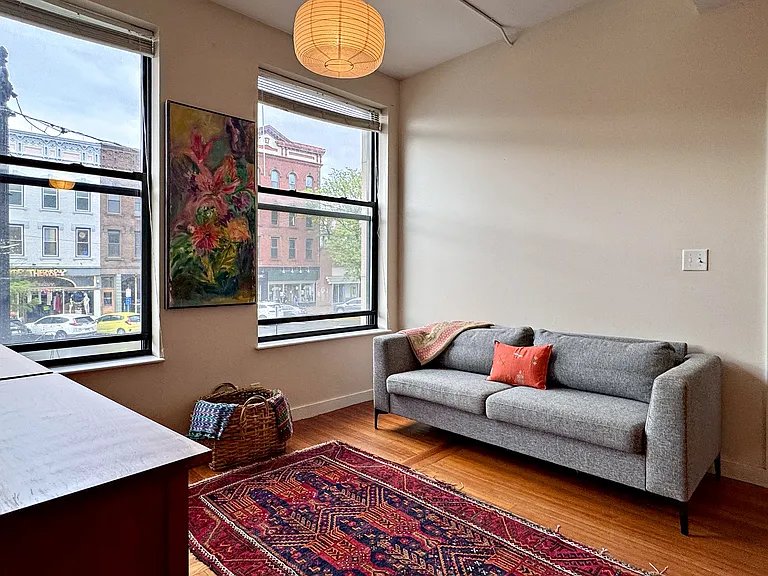 Living room is in the center between the two bedrooms.