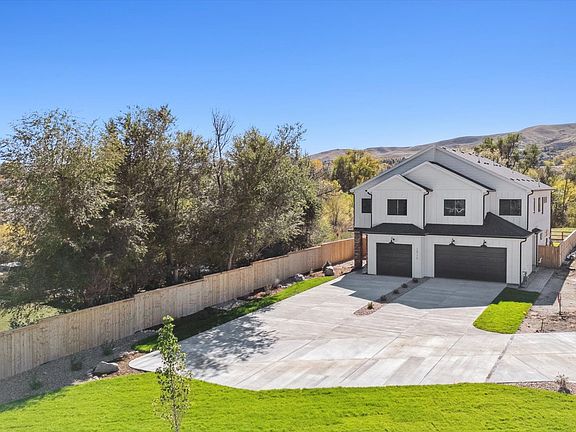Upgraded chef kitchen that includes High-quality quartz countertops, stylish top of the line COSMO vent and 6-burner gas stove with a pot-filler faucet.