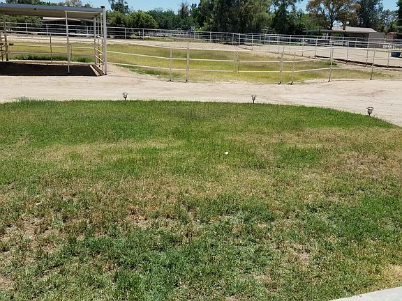 Partial back yard and pasture
