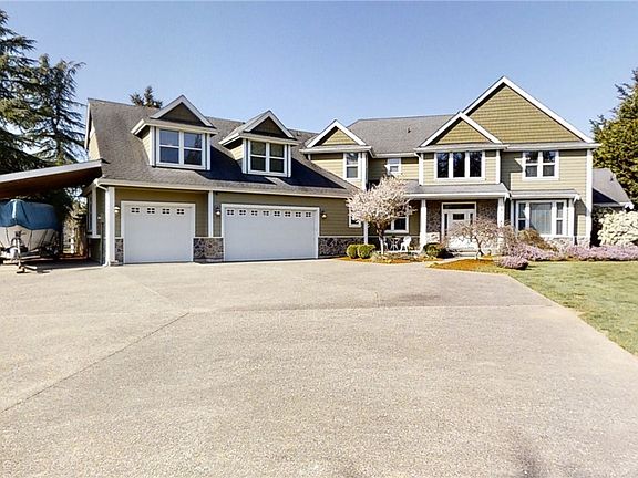 Luxury meets Lifestyle in this Beautiful Two Story on Shy Acre Lot.