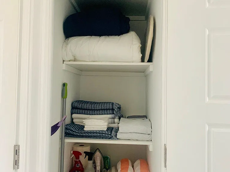 Large linen closet in bathroom