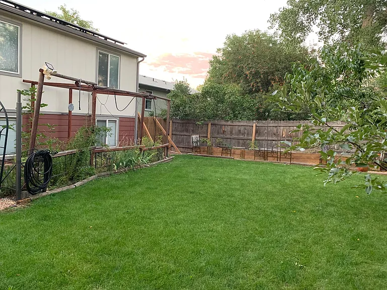 Fragrant garden with sage, lavender, hops, roses, lilies, strawberries, blueberries. Additional raised beds for additional growing of your choice. Mister system throughout the backyard to cool you down in summer.