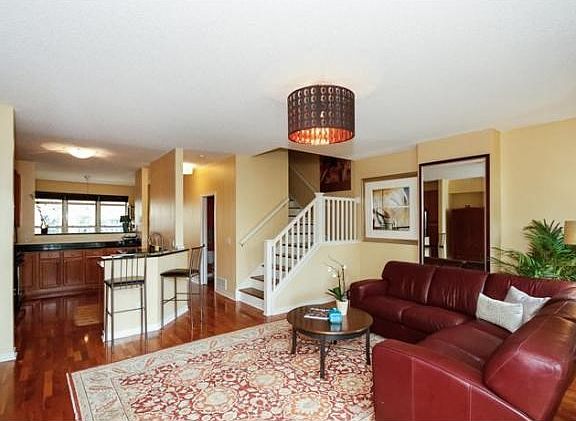 Beautiful townhome with custom updates and hardwood floors throughout.