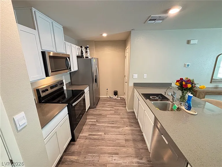 6173 Hibiscus Garden St — Photo 7