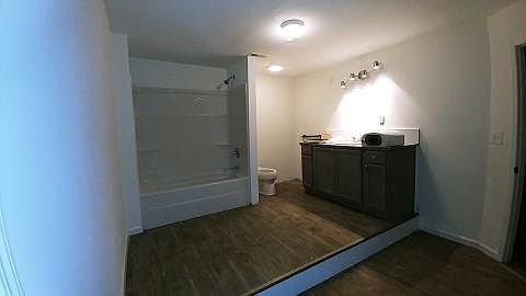 One of 3 large bathrooms! This bathroom has a step-up area and room for large makeup area, storage It's a completely new bathroom with all new plumbing, lighting, toilet and shower. People LOVE it and you will too :)