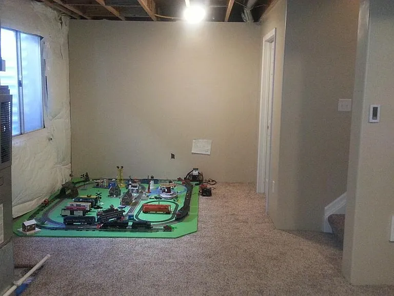Partially finished room in basement (left of stairs)