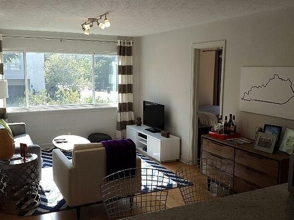 Living room with a view of the green space below